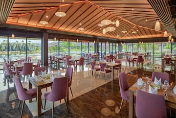 a restaurant with tables and chairs