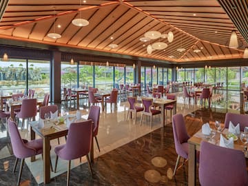 a restaurant with tables and chairs