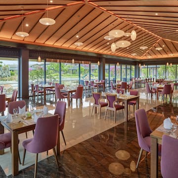 a restaurant with tables and chairs