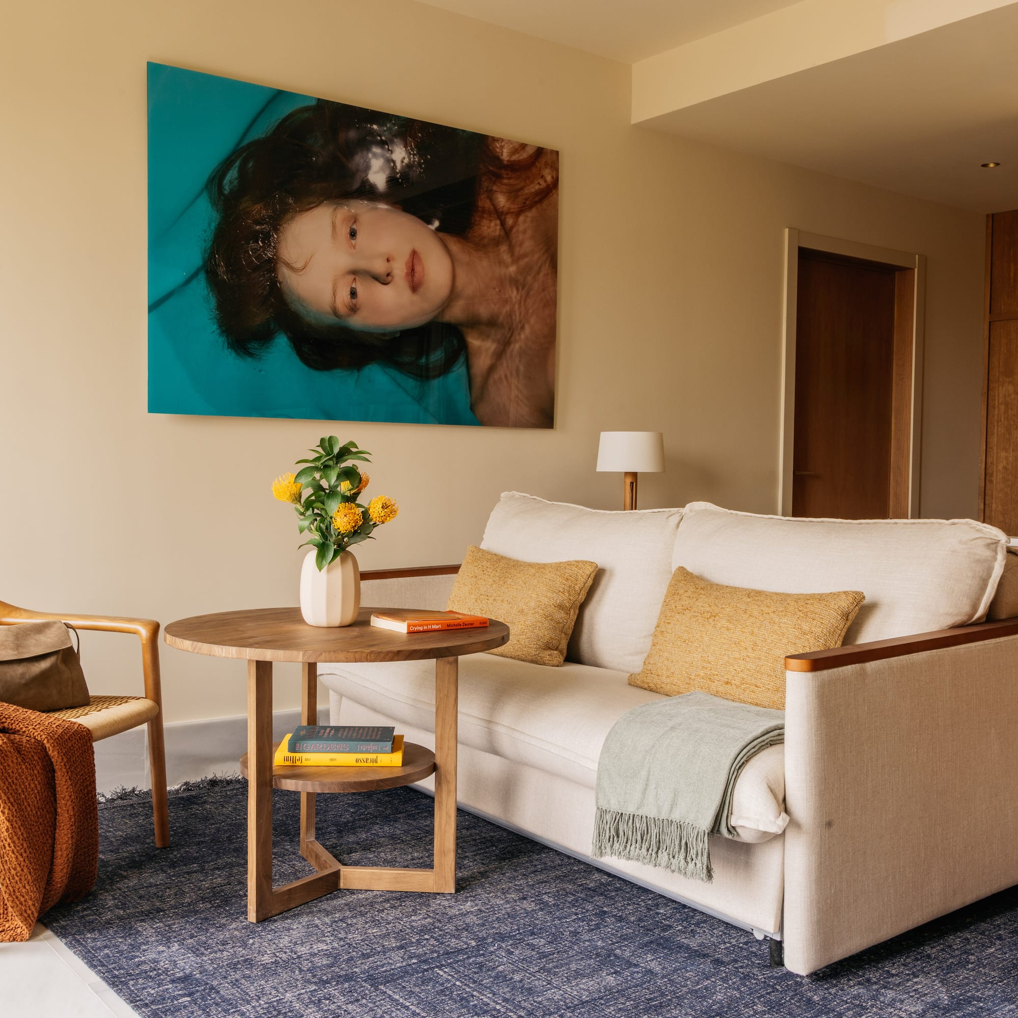 a living room with a couch and a table