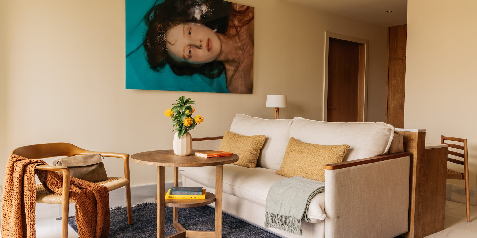 a living room with a couch and a table