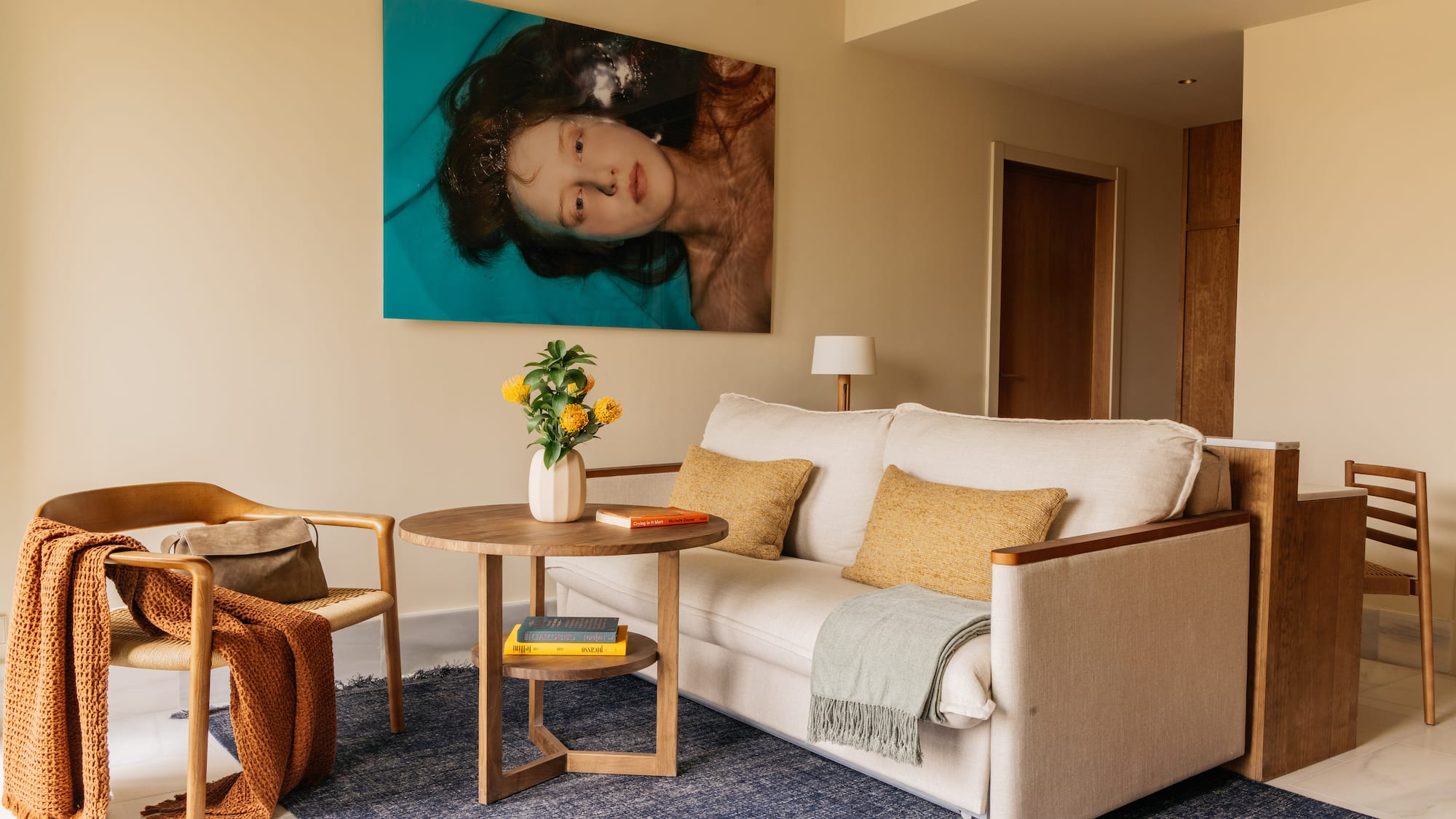 a living room with a couch and a table