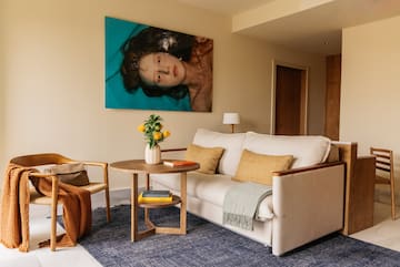 a living room with a couch and a table