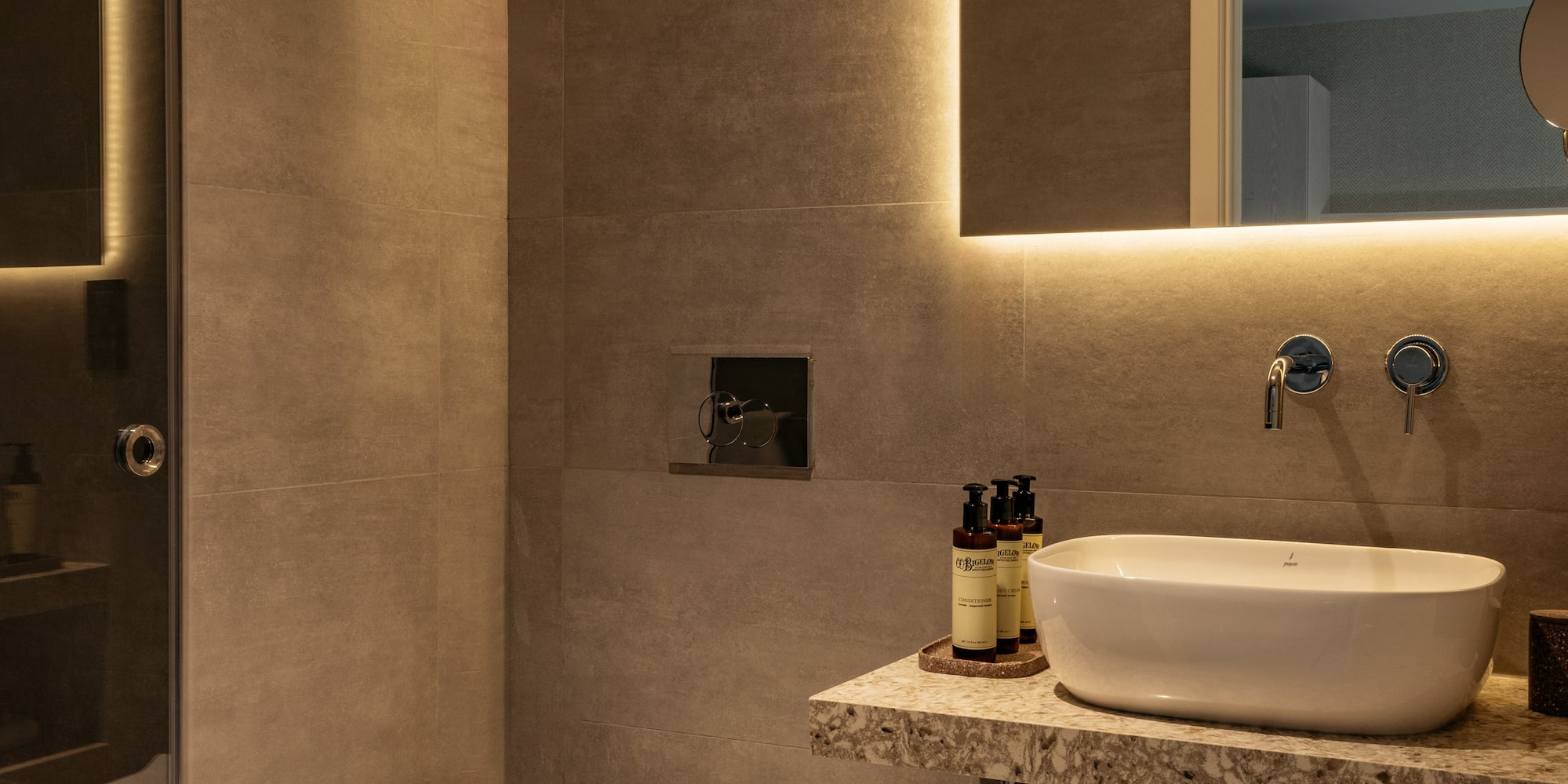 a bathroom with a sink and toilet