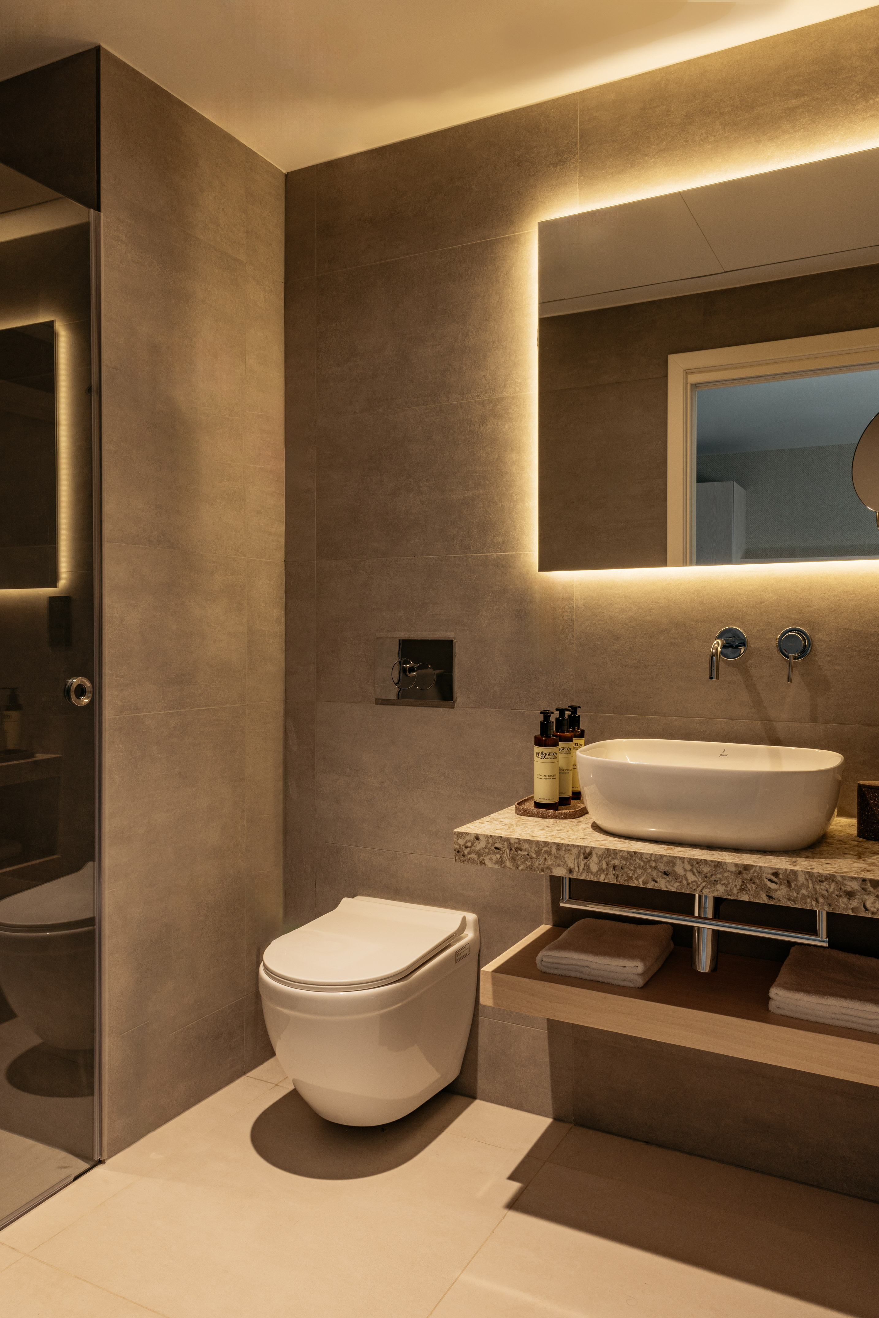 a bathroom with a sink and toilet