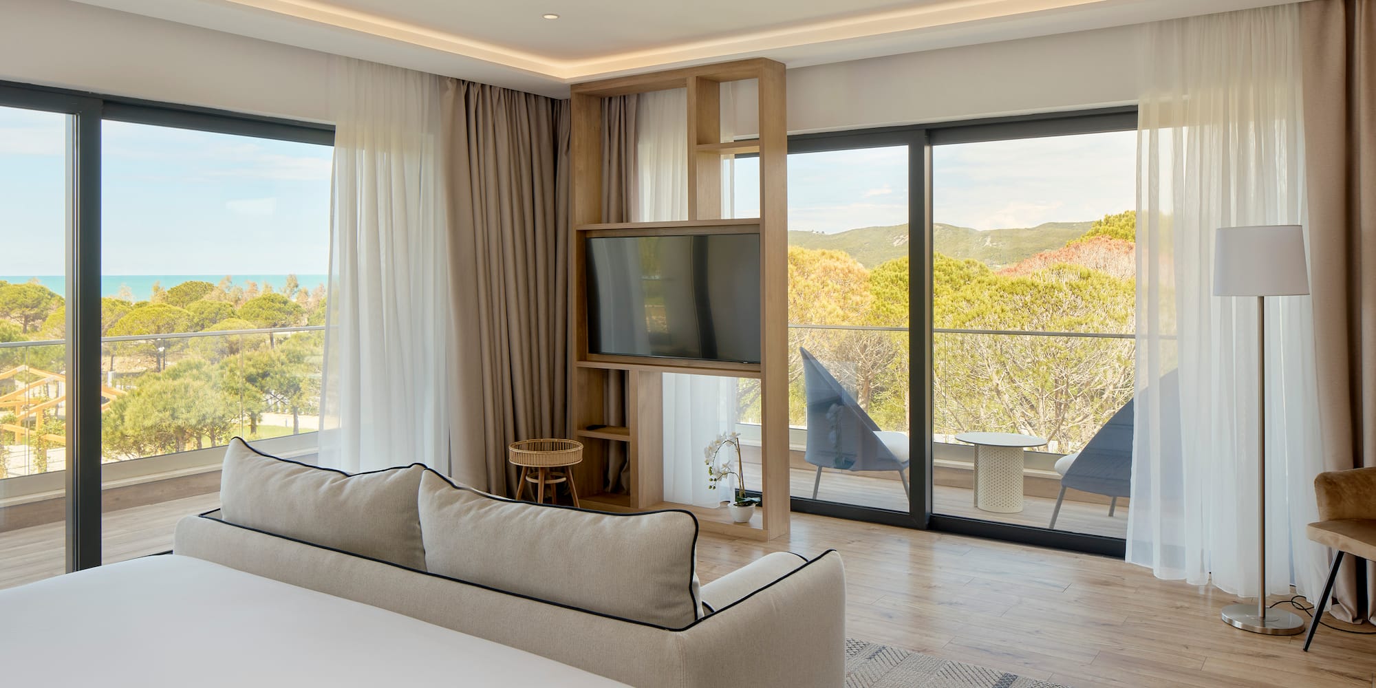 a room with a television and a bed