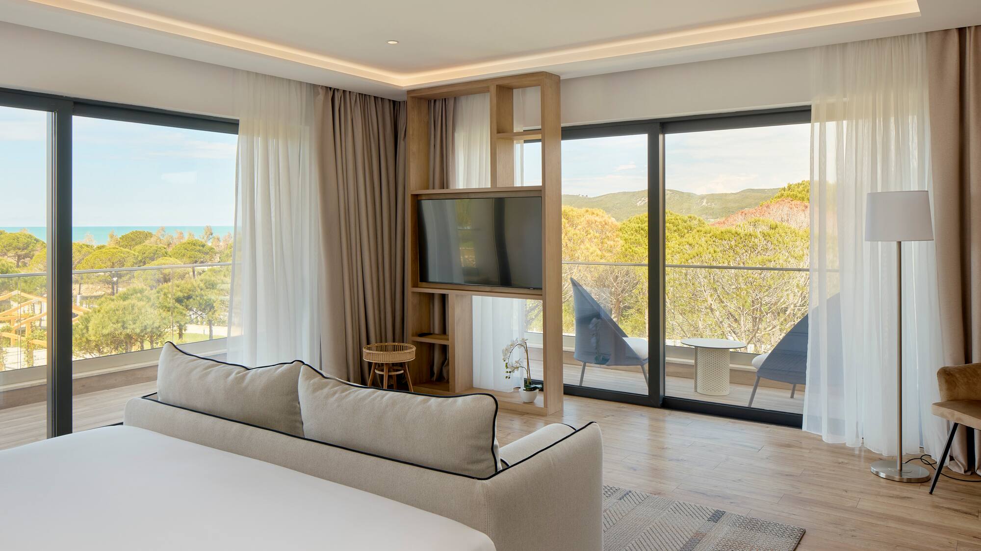 a room with a television and a bed