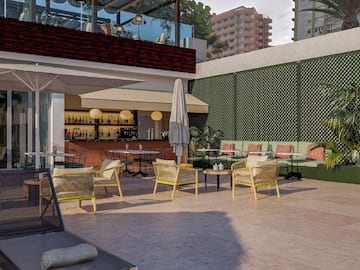 a patio with chairs and tables