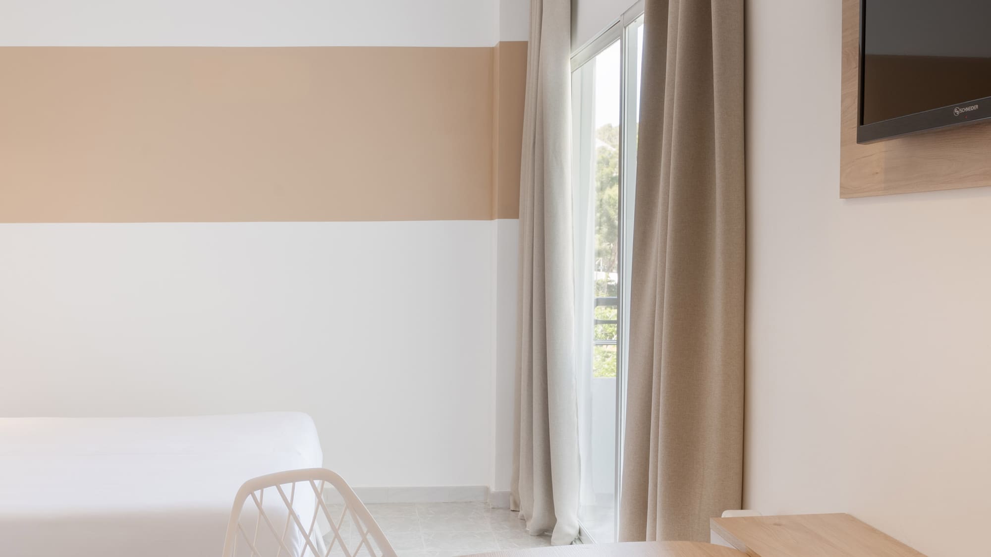 a room with a bed and a table