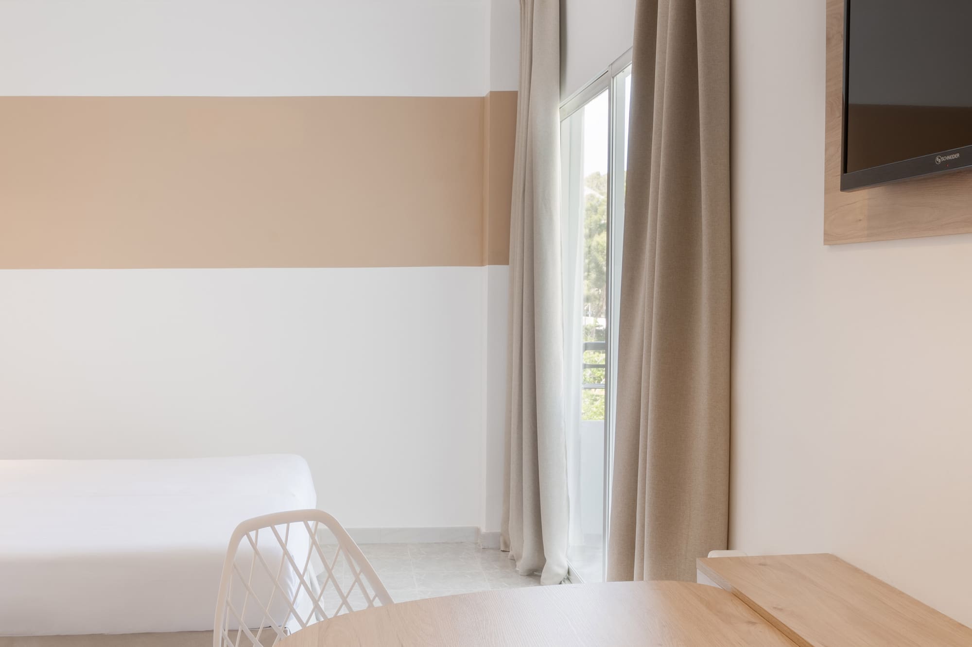 a room with a bed and a table