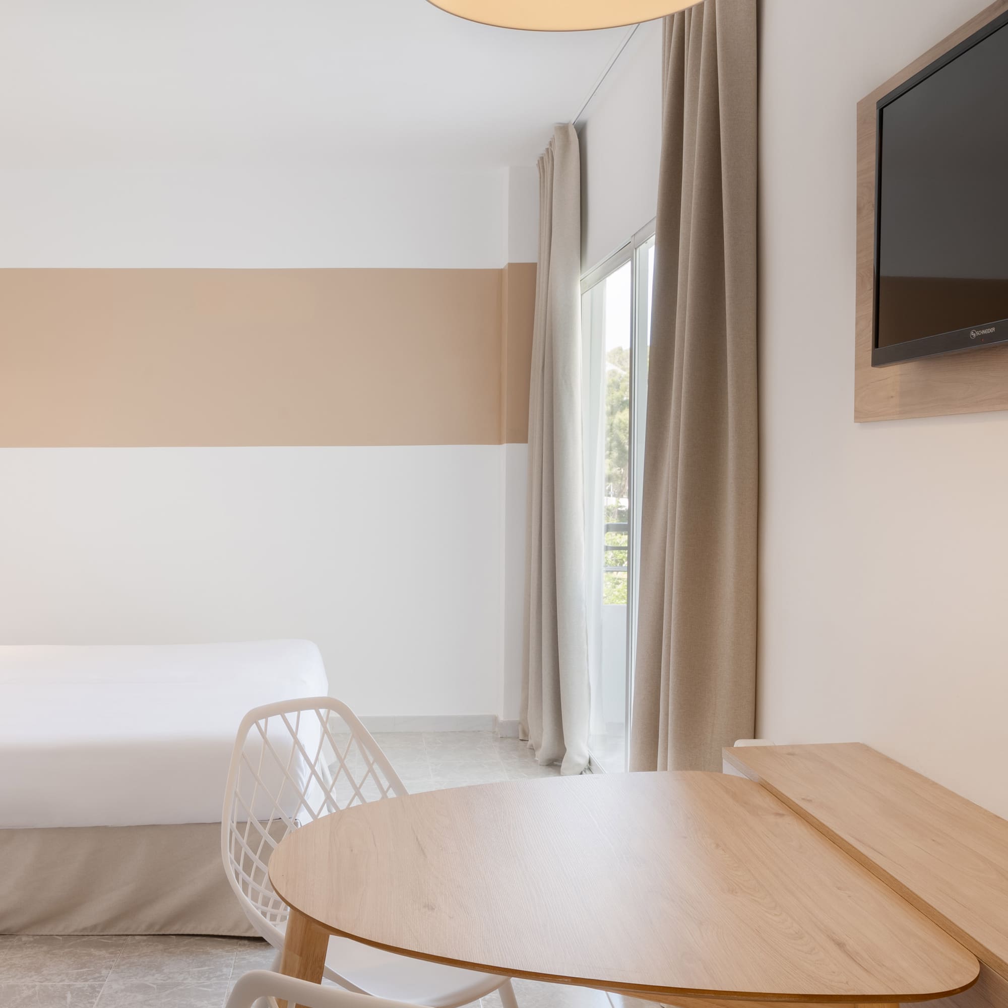 a room with a bed and a table