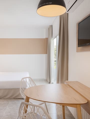 a room with a bed and a table