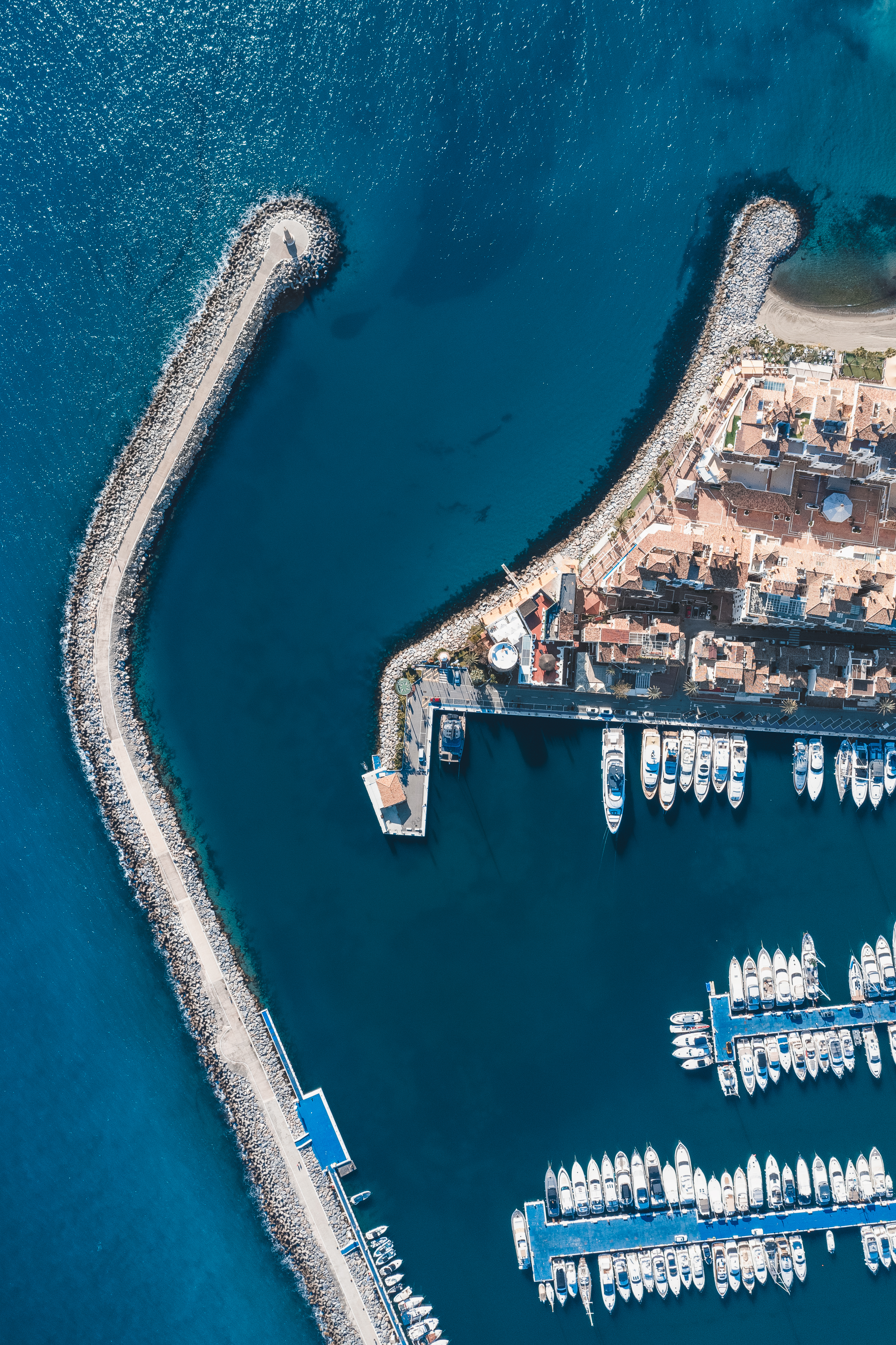 a aerial view of a harbor with boats