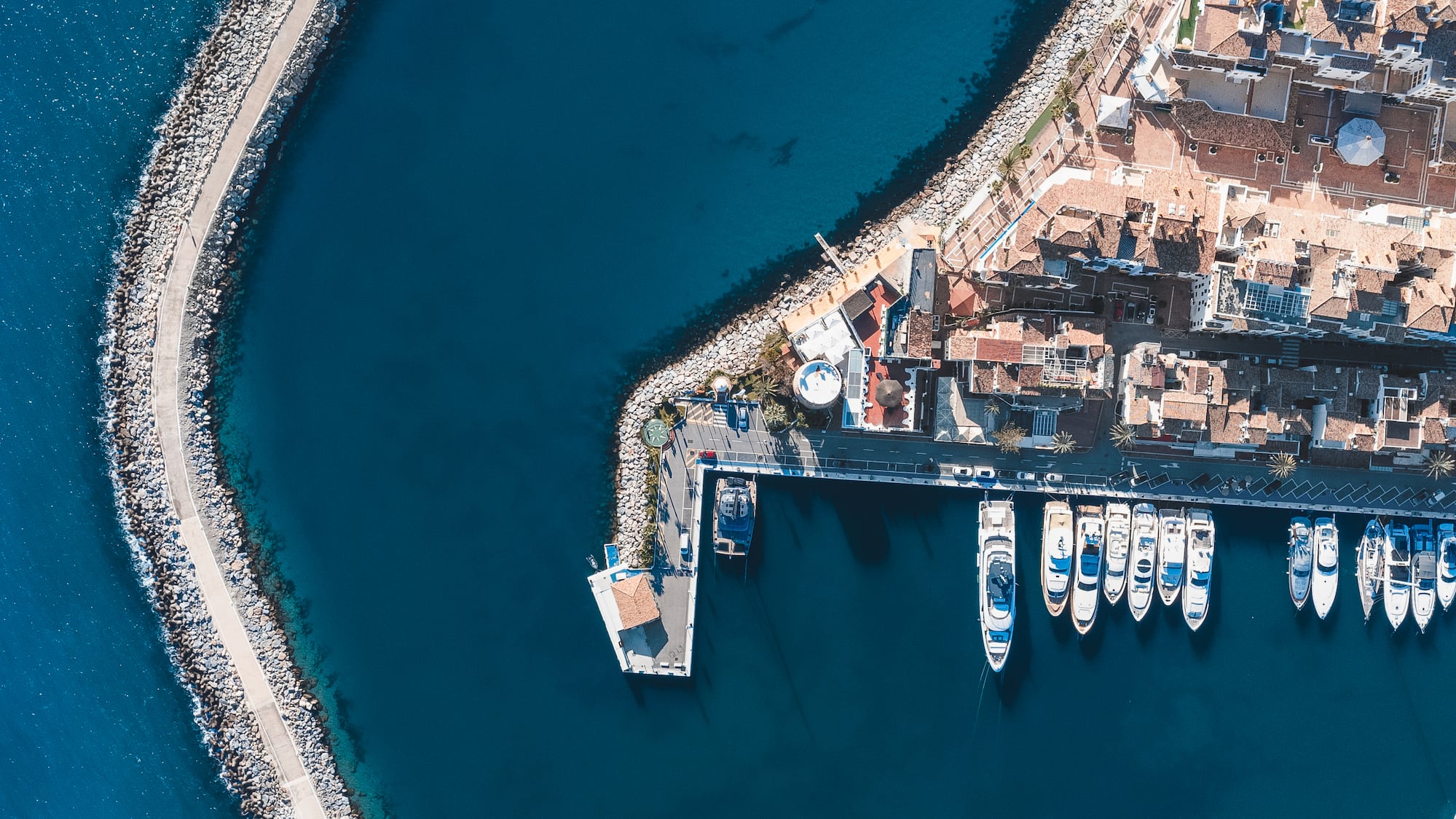 a aerial view of a harbor with boats