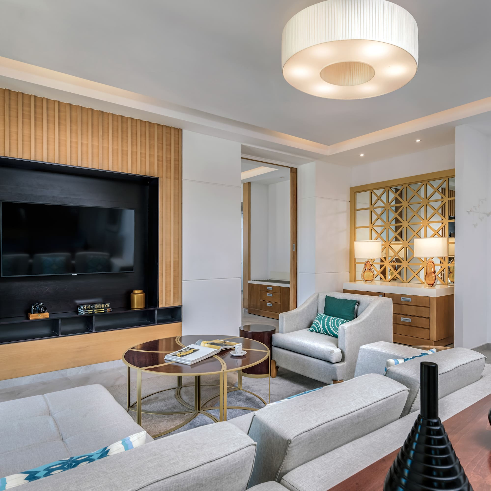 a room with a television and couches