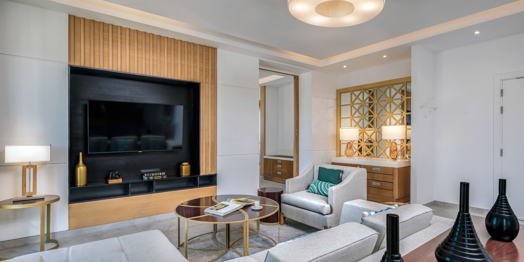 a room with a television and couches