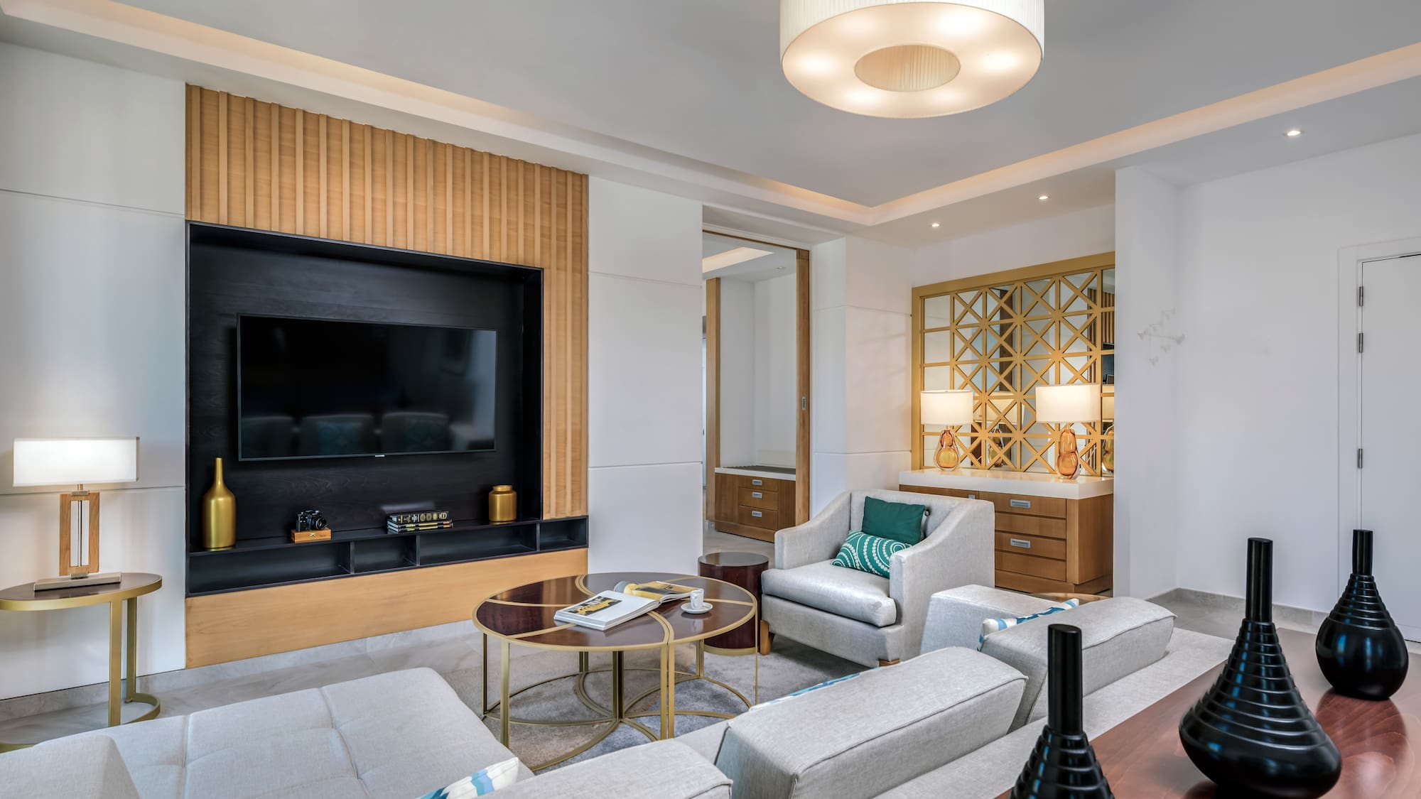 a room with a television and couches