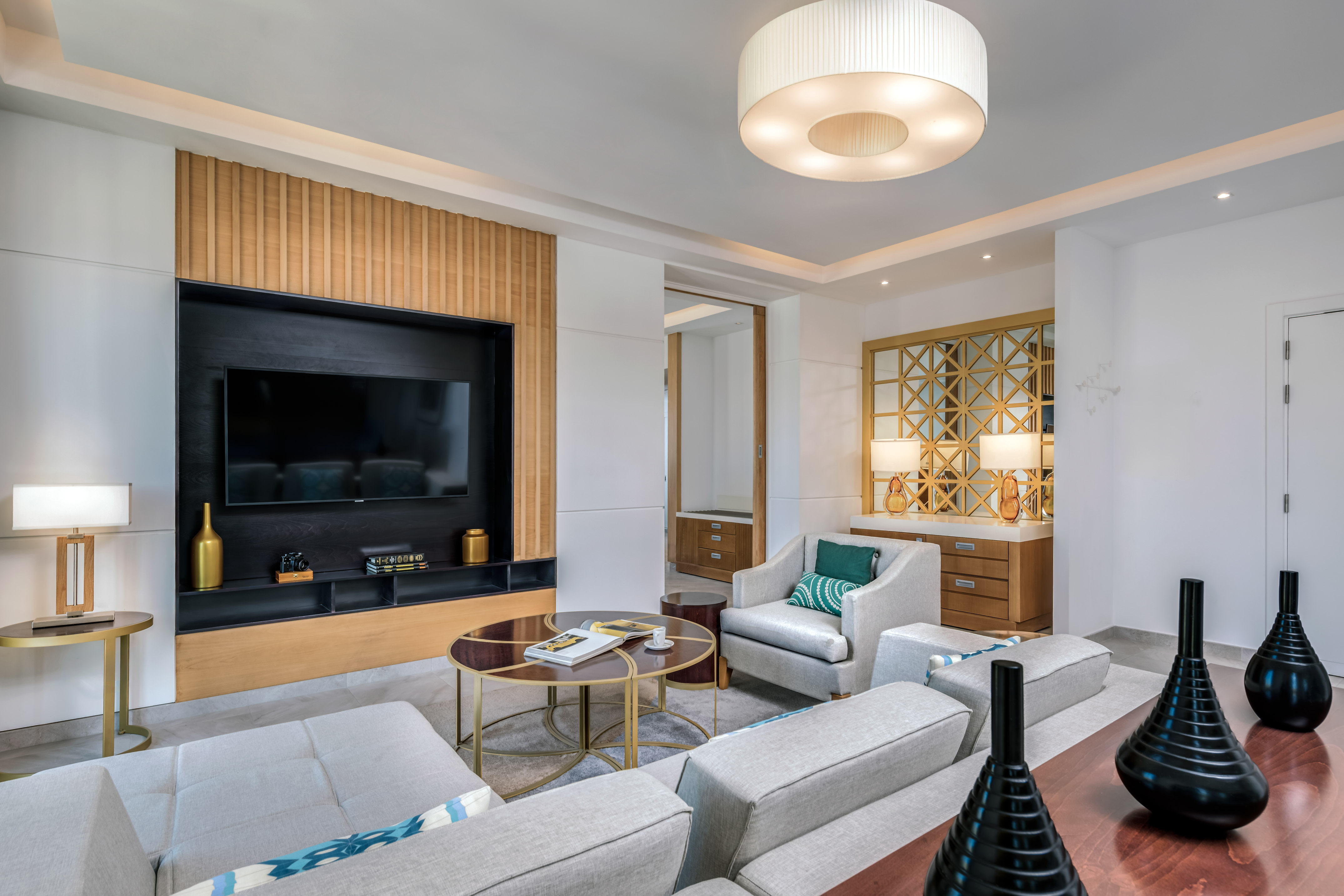 a room with a television and couches