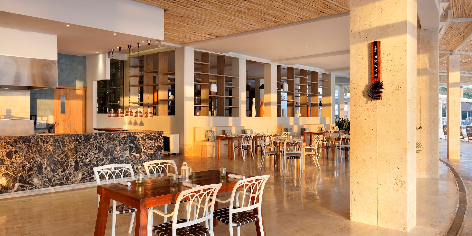 a room with a table and chairs