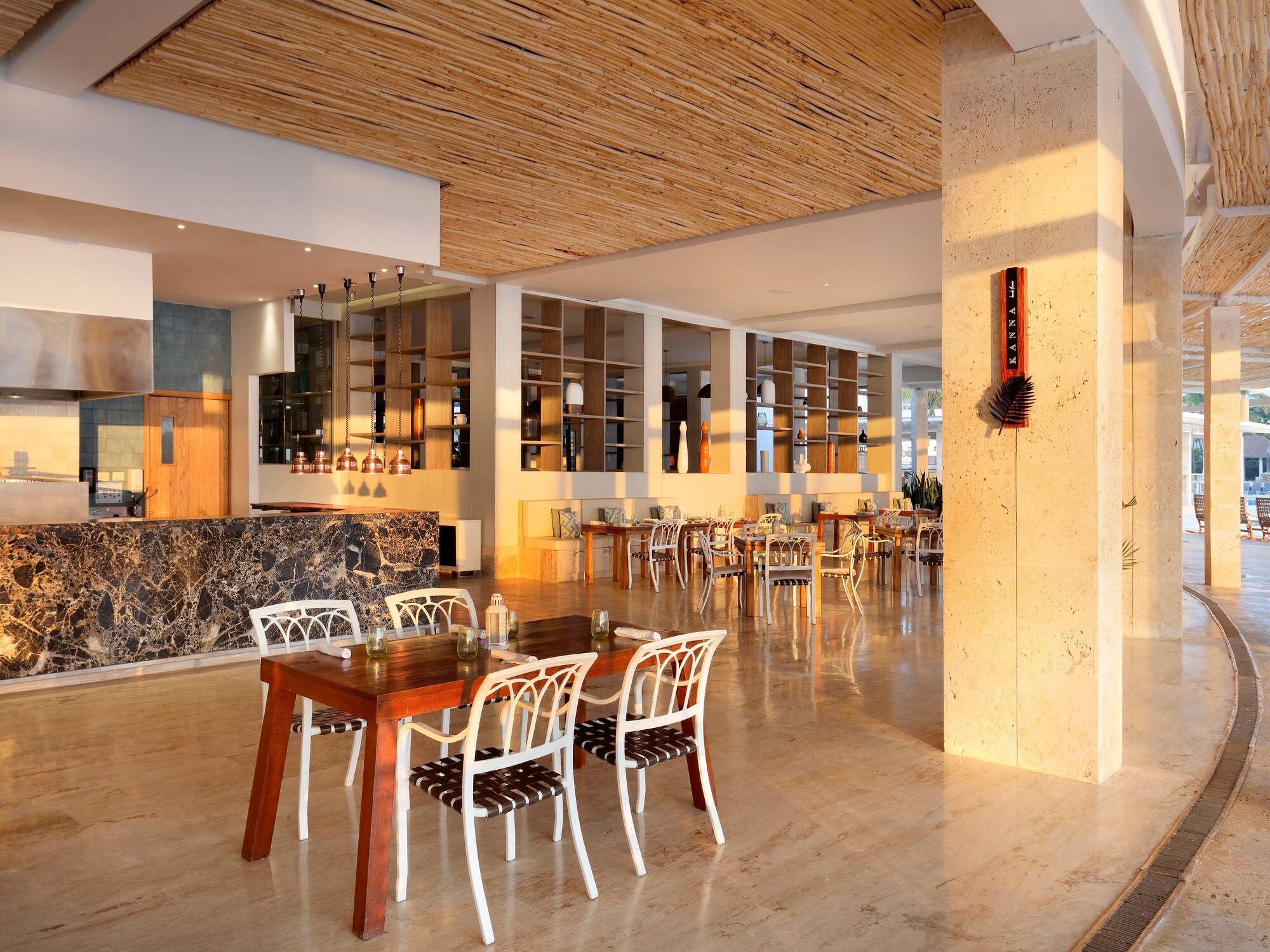 a room with a table and chairs