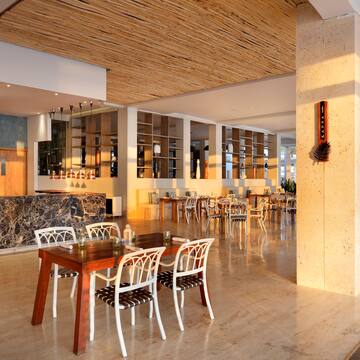 a room with a table and chairs