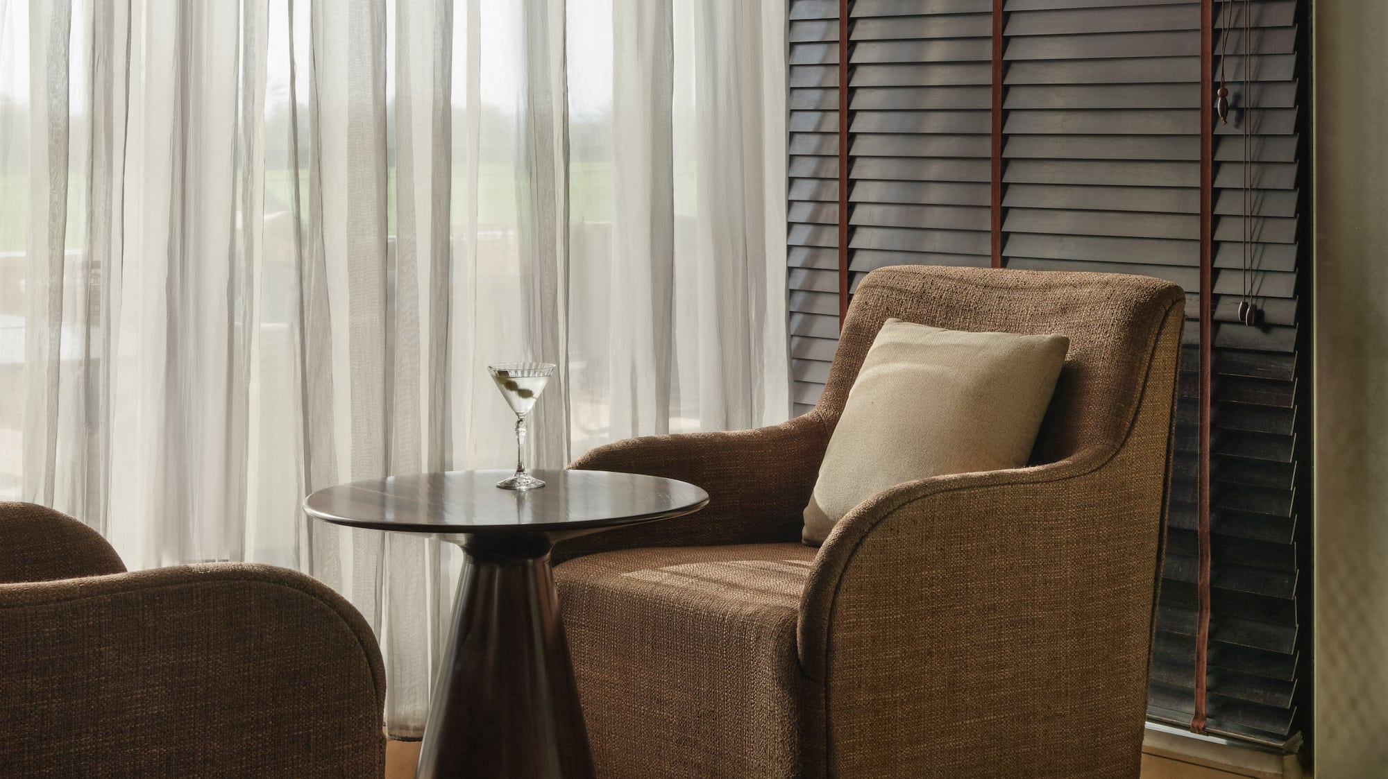 a room with a table and chairs