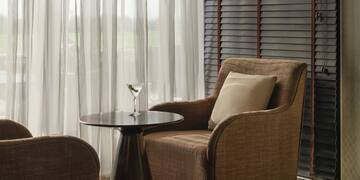 a room with a table and chairs