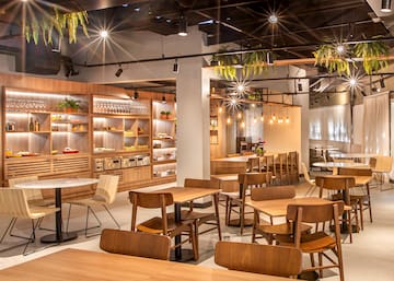 a room with tables and chairs