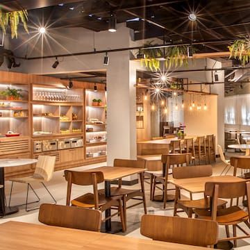 a room with tables and chairs