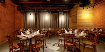 a room with tables and chairs