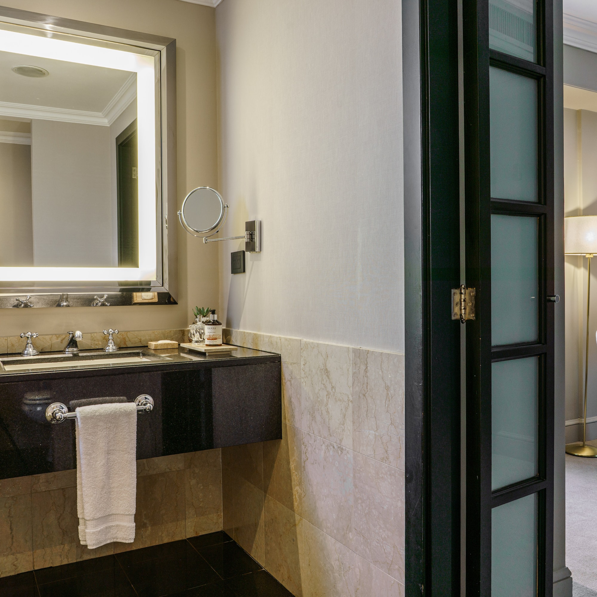 a bathroom with a mirror and sink