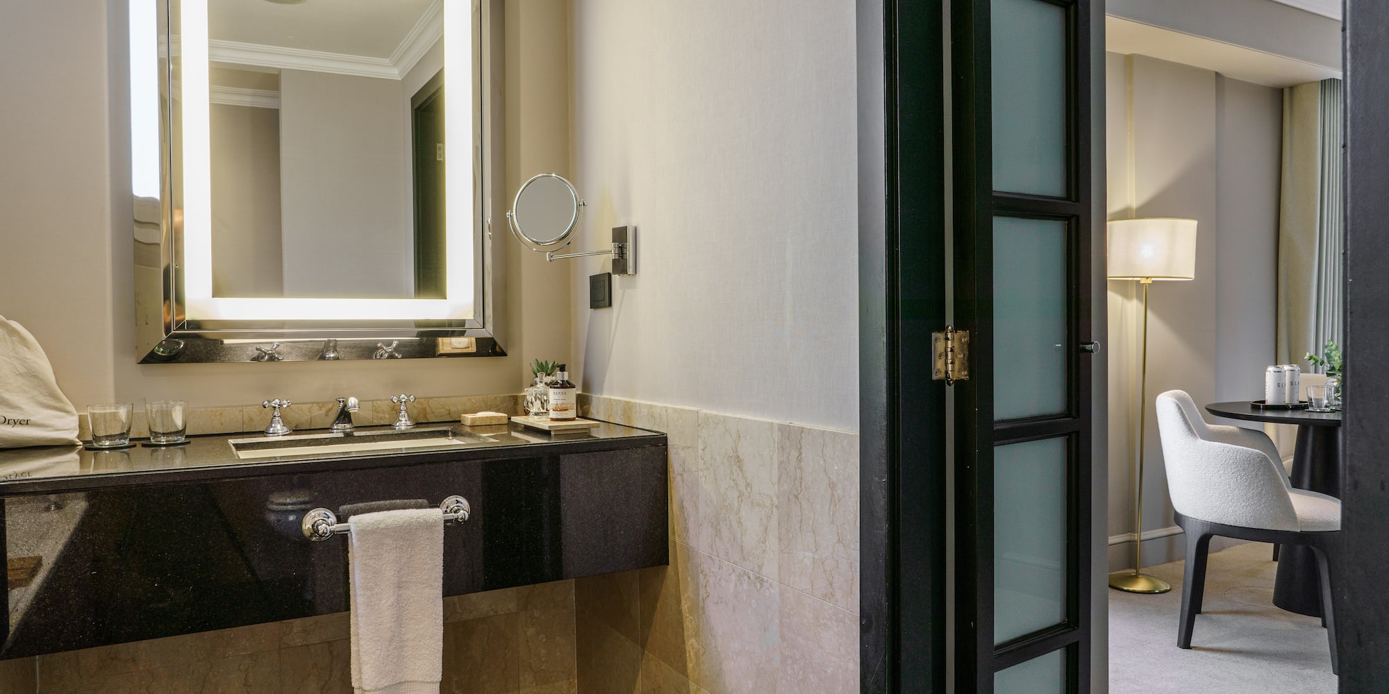 a bathroom with a mirror and sink