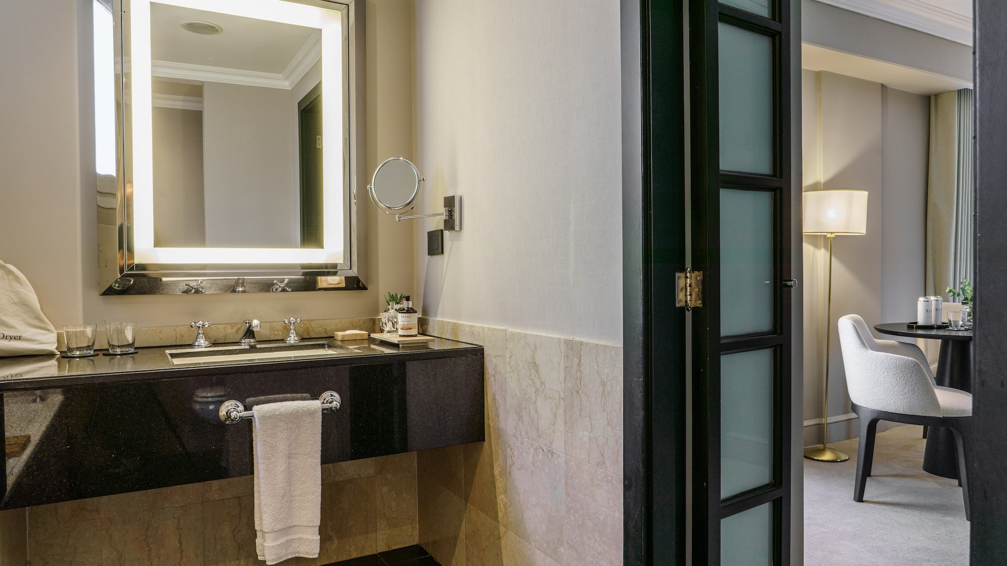 a bathroom with a mirror and sink