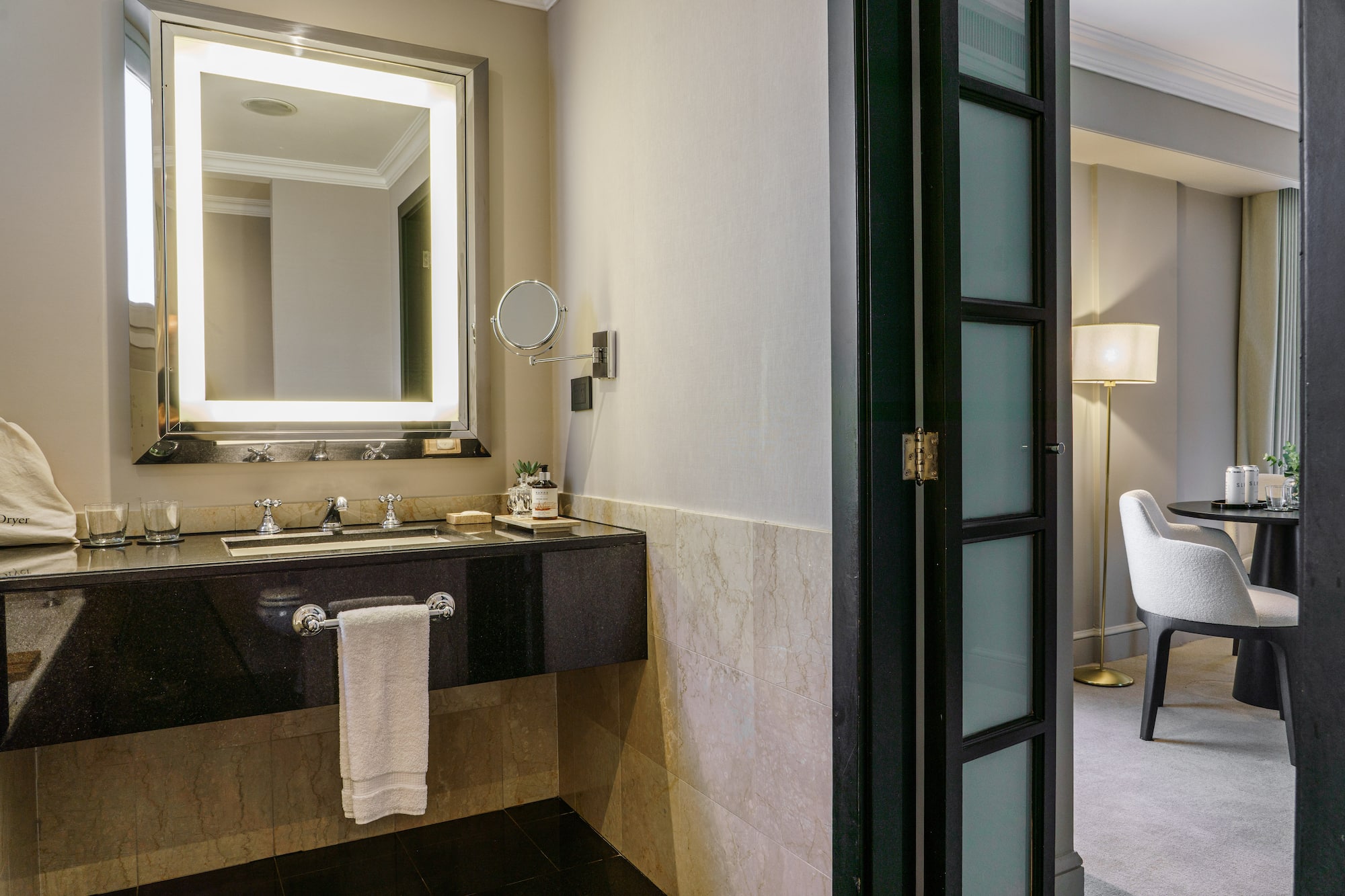 a bathroom with a mirror and sink