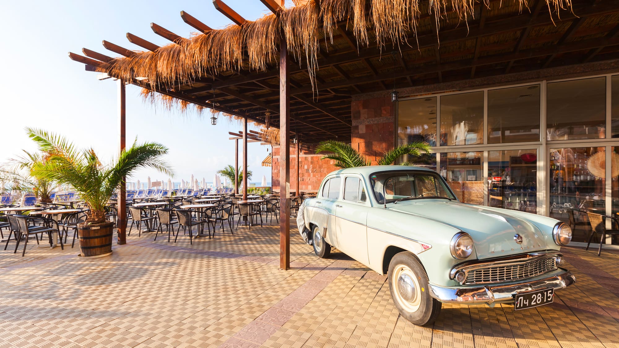a car parked outside a restaurant