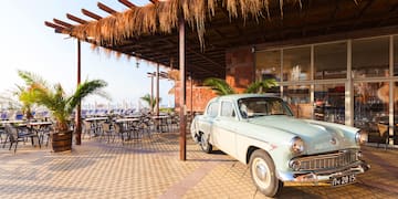 a car parked outside a restaurant