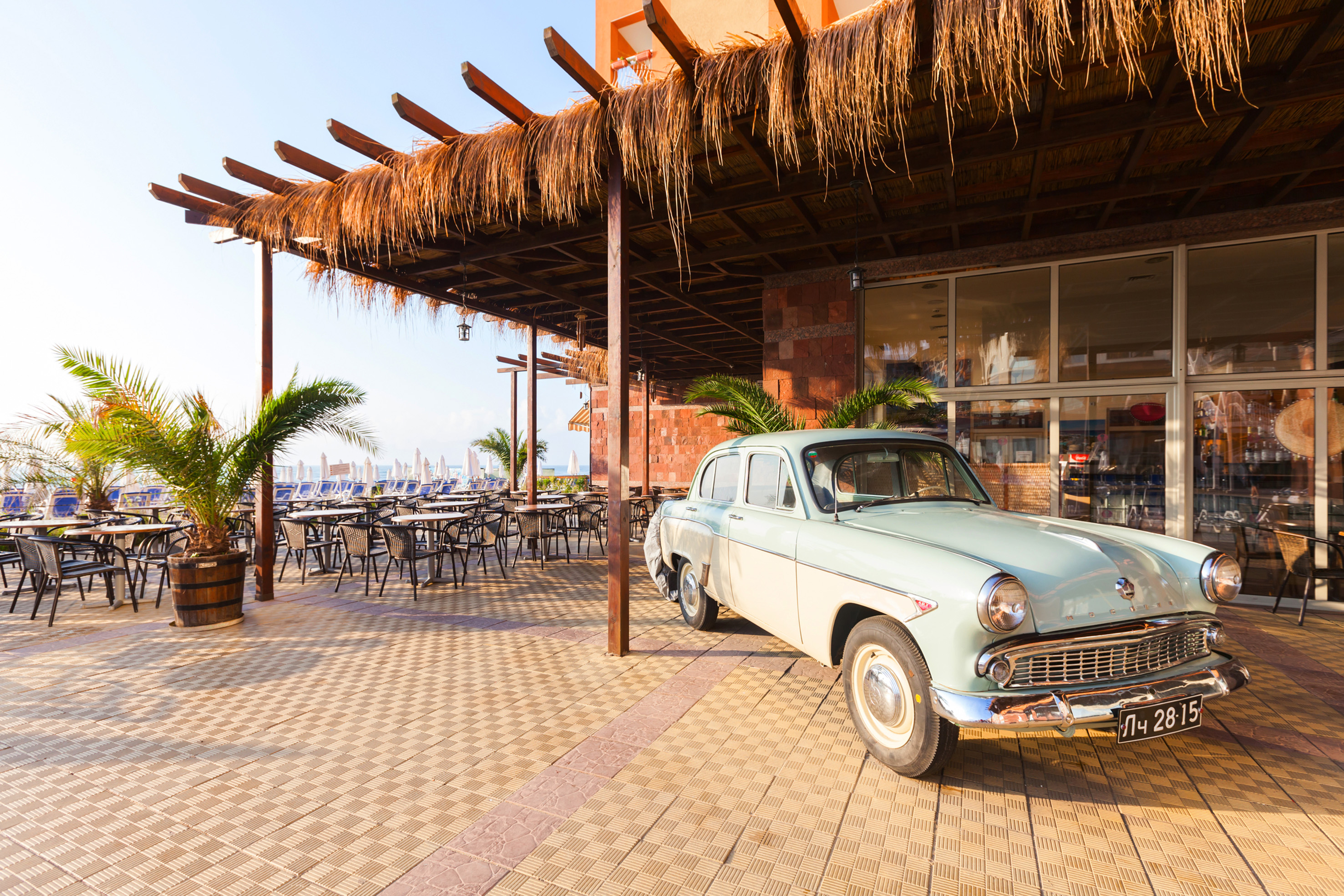 a car parked outside a restaurant