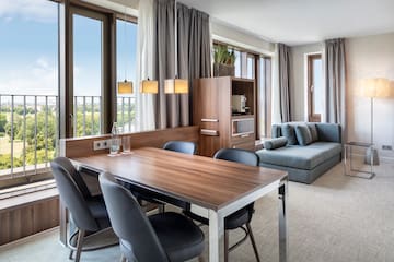 a room with a table and chairs