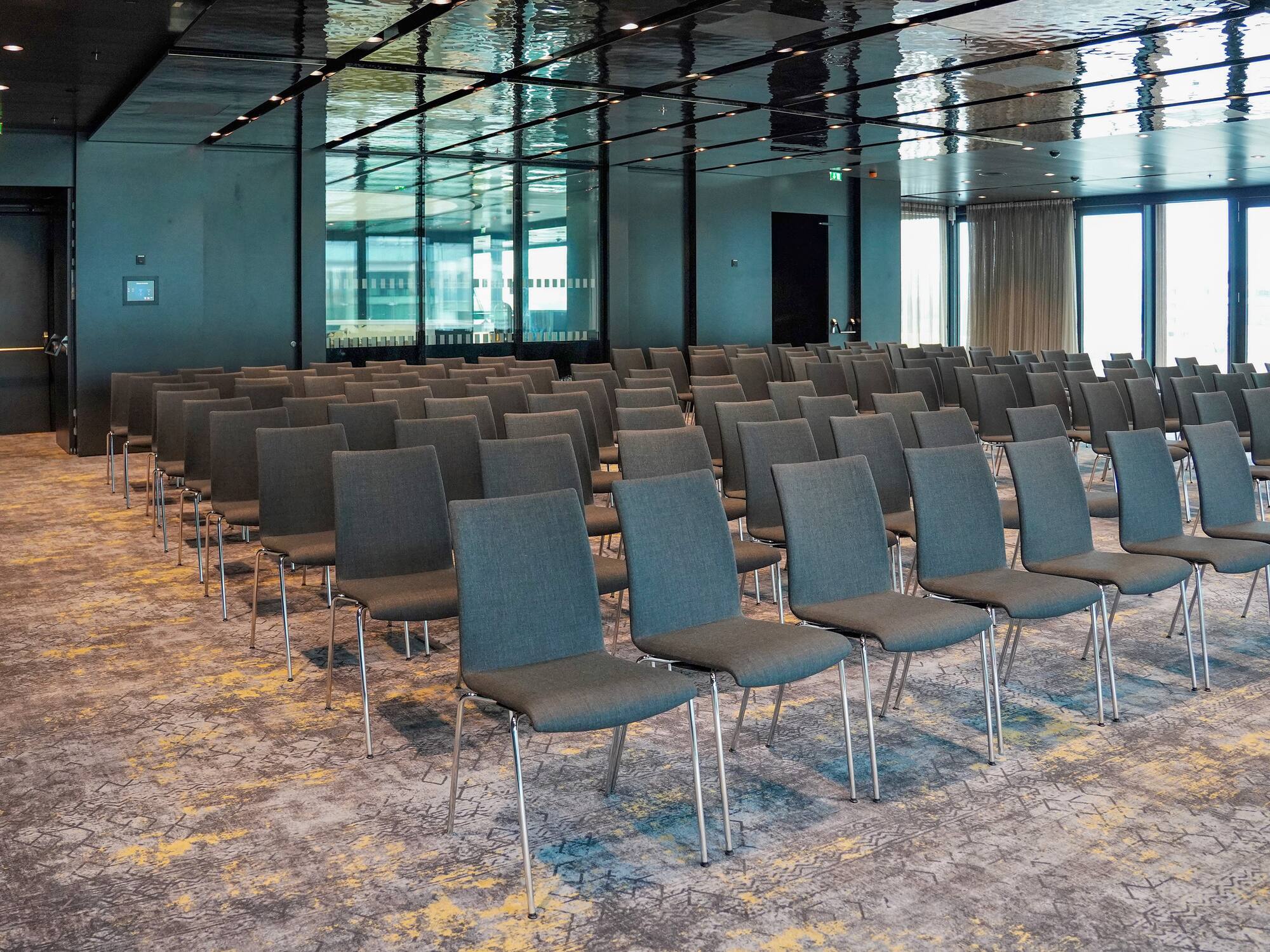 a group of chairs in a room.
