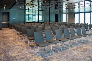 a group of chairs in a room.