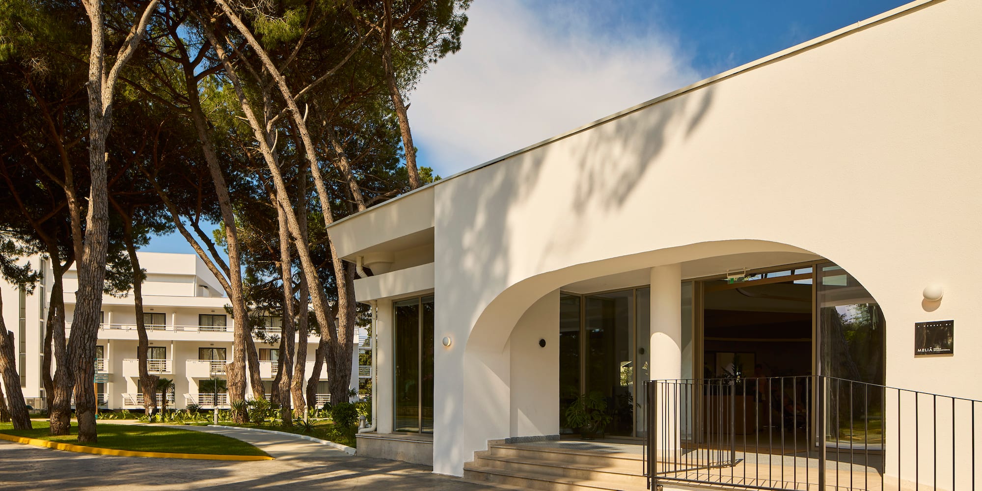 a building with trees in front of it
