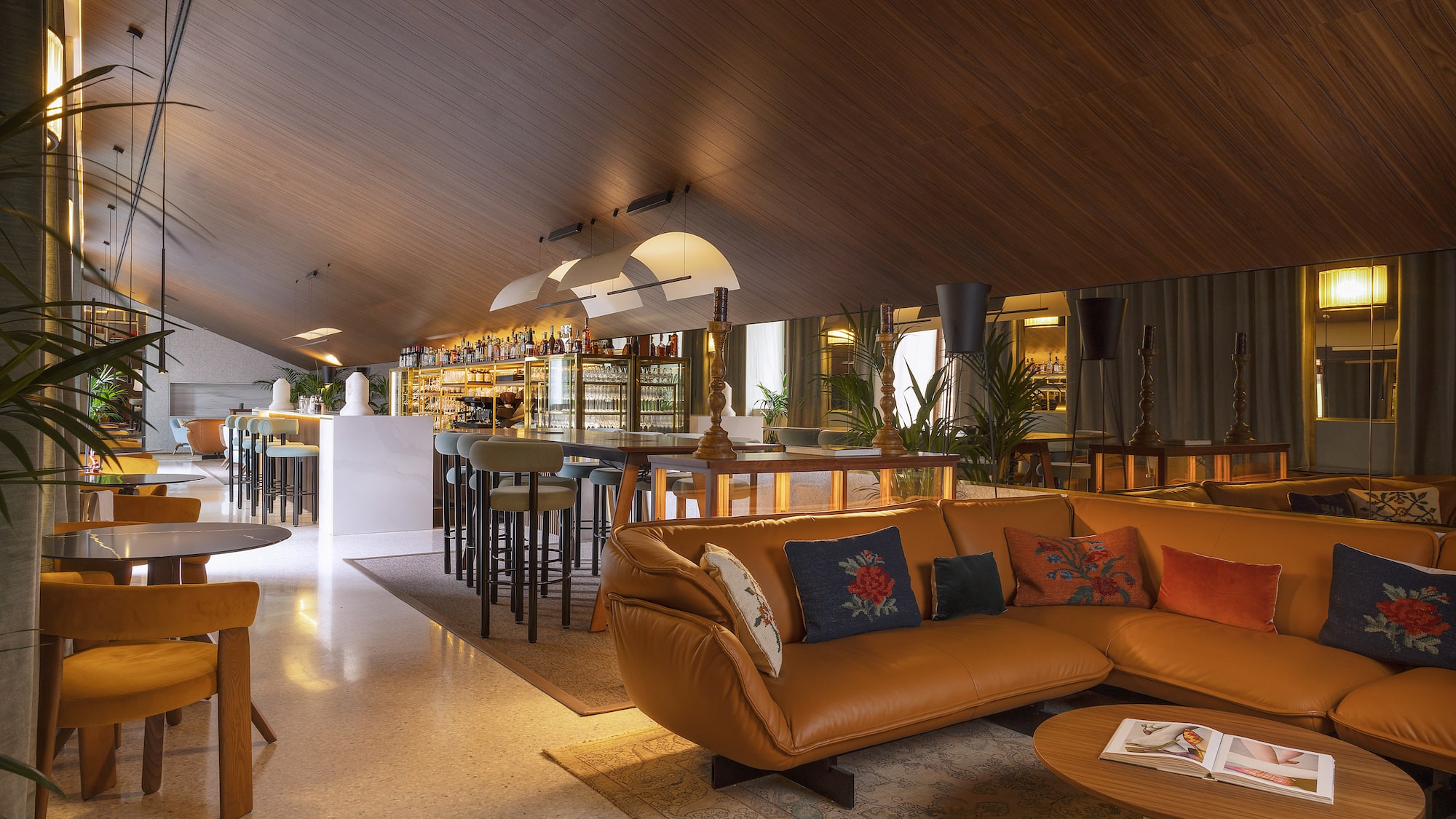 a room with a couch and a bar