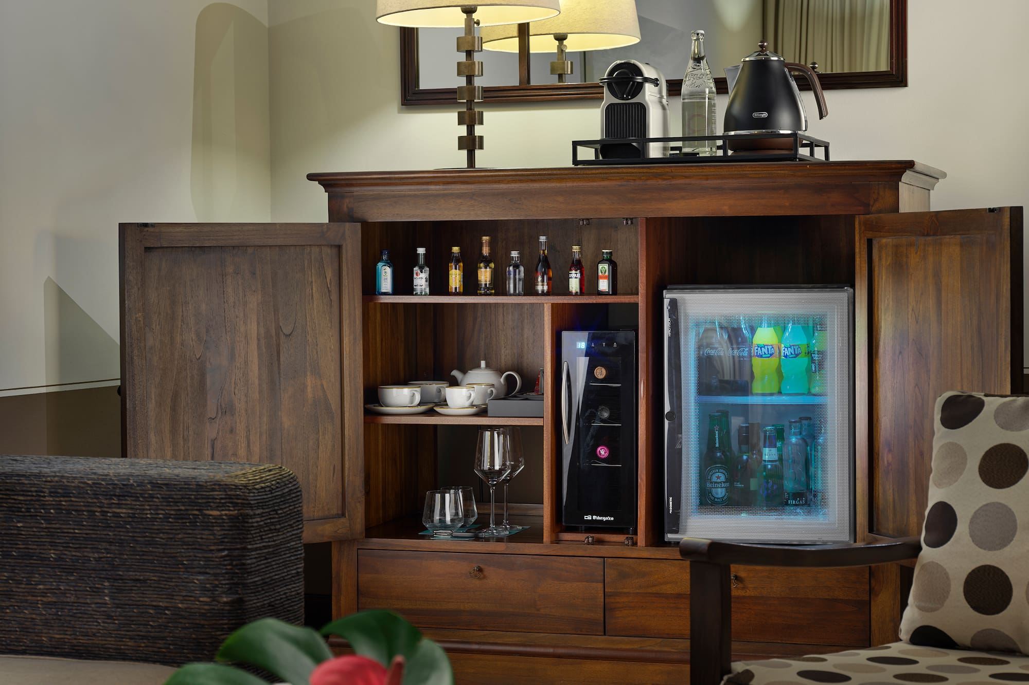 a room with a cabinet and a television