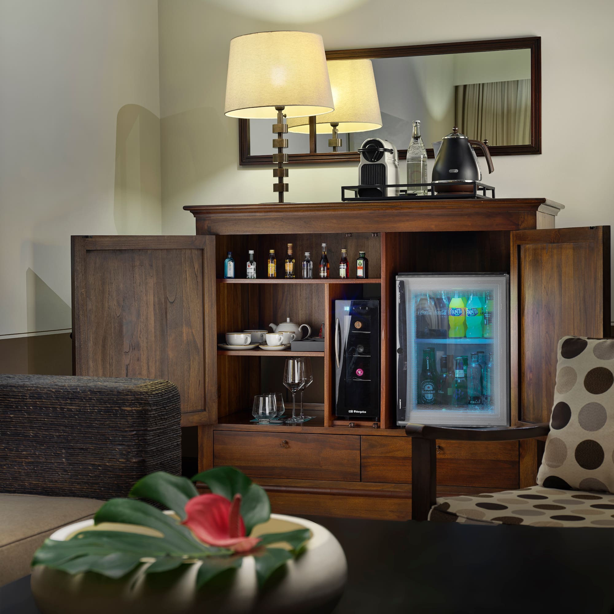 a room with a cabinet and a television