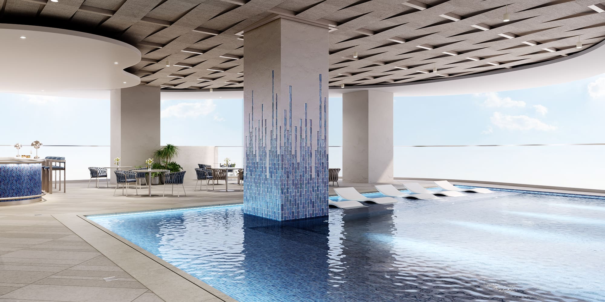 a pool with chairs and a large ceiling