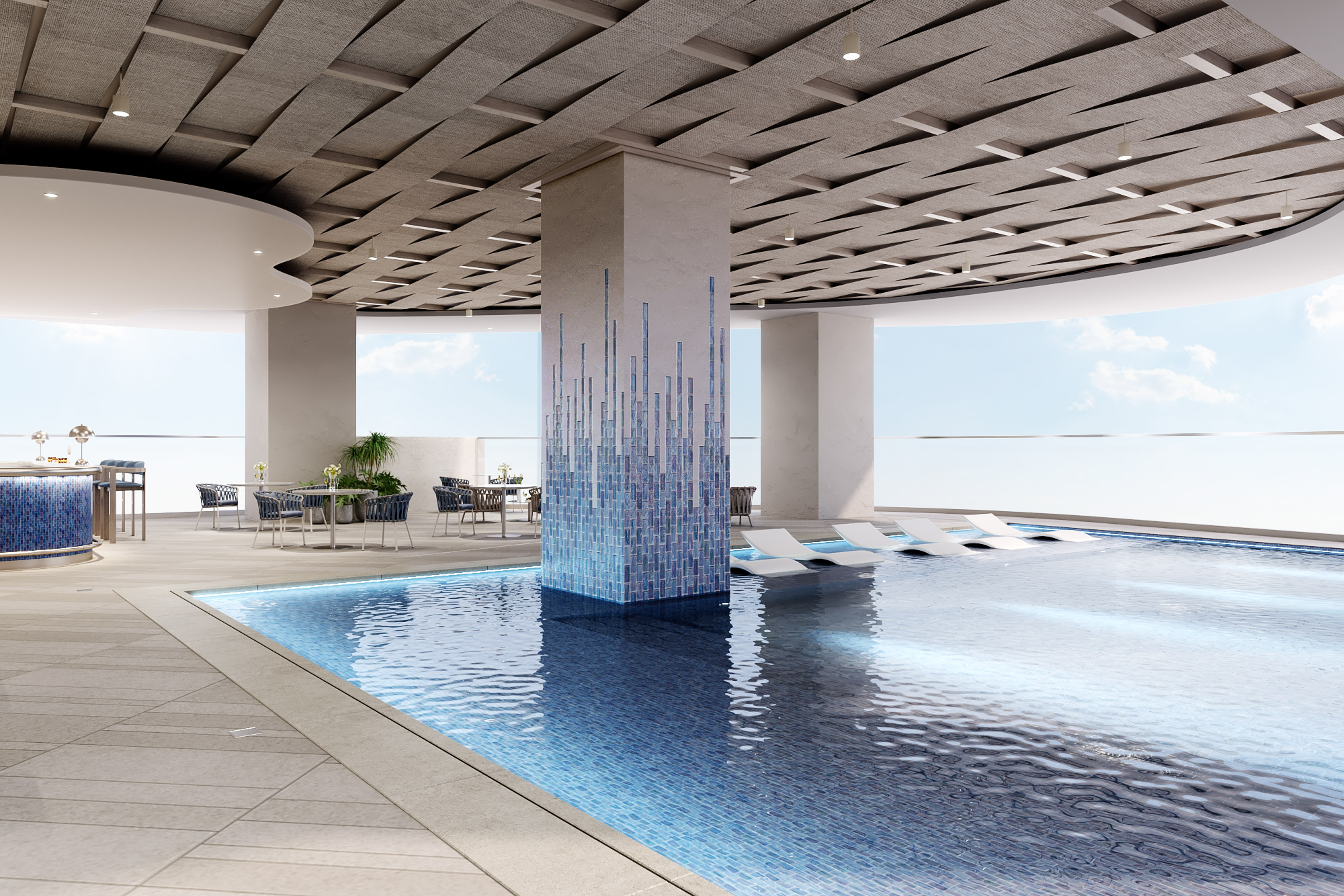 a pool with chairs and a large ceiling