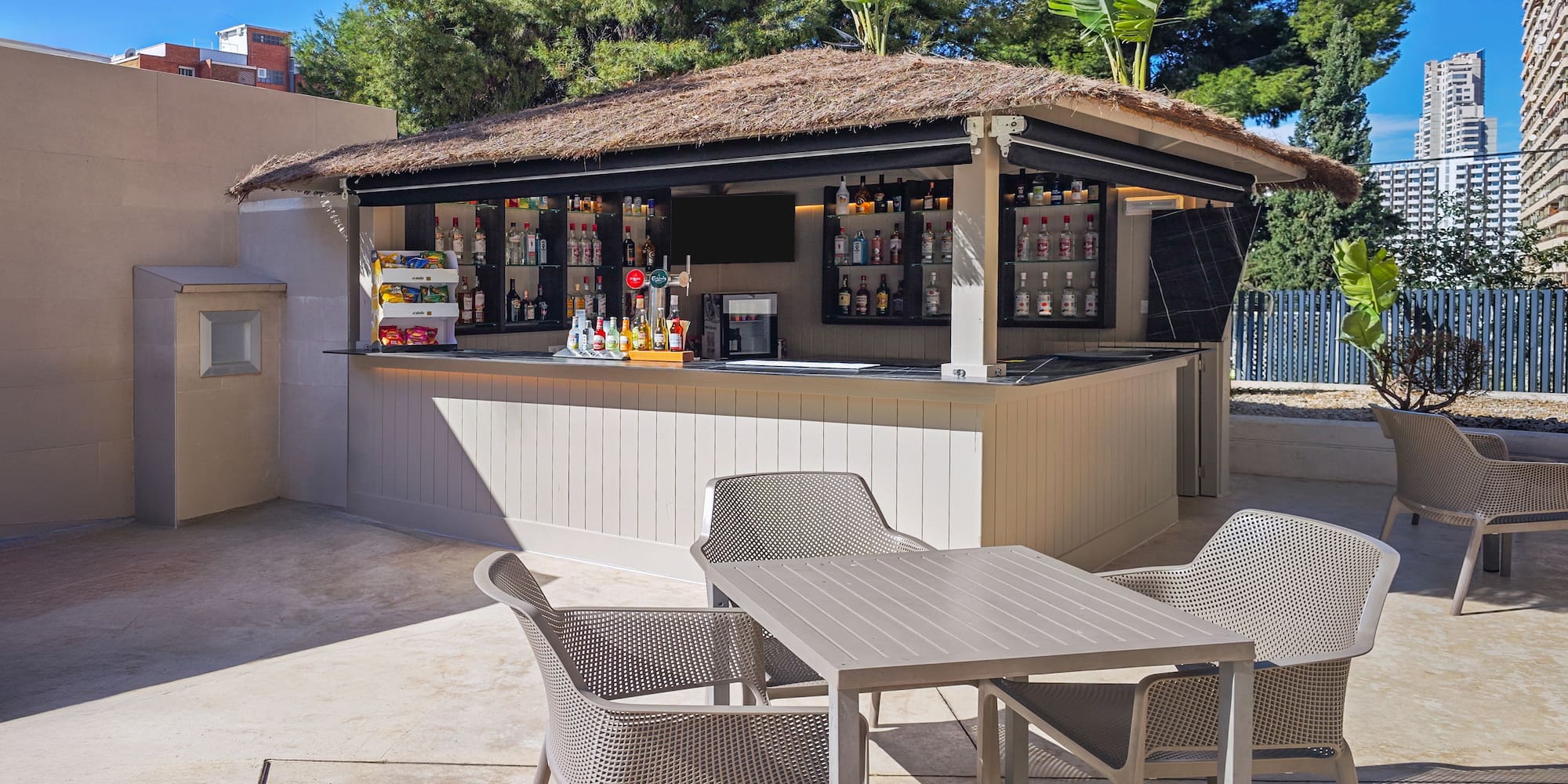 a bar with chairs and tables
