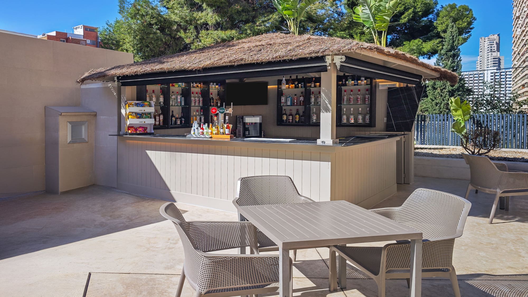 a bar with chairs and tables
