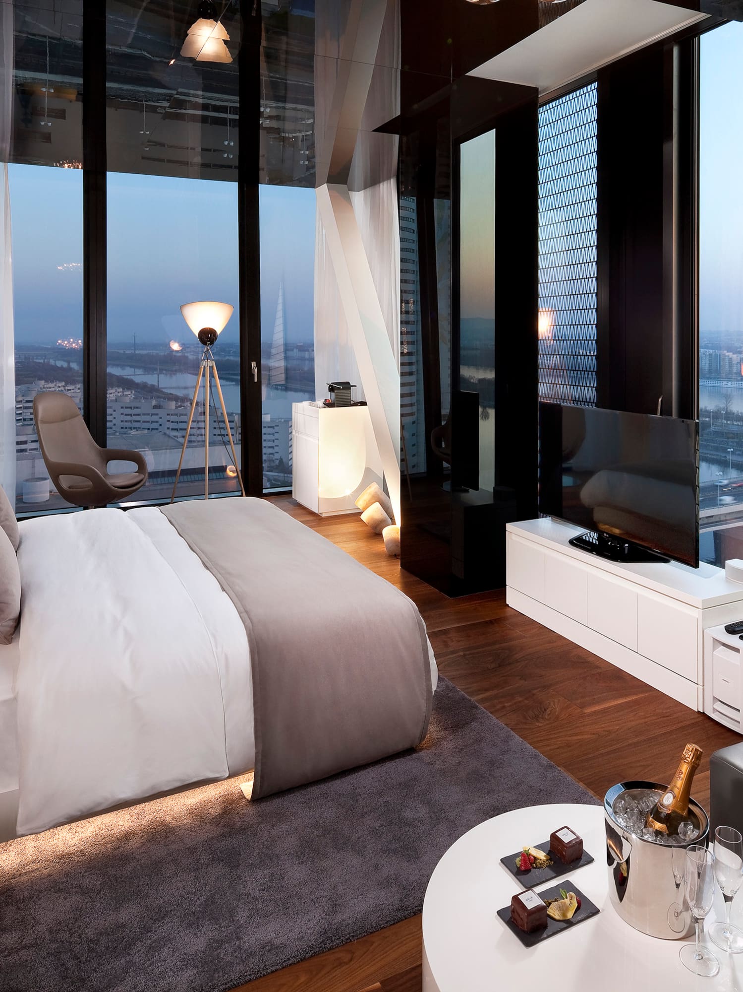 a bedroom with a large window