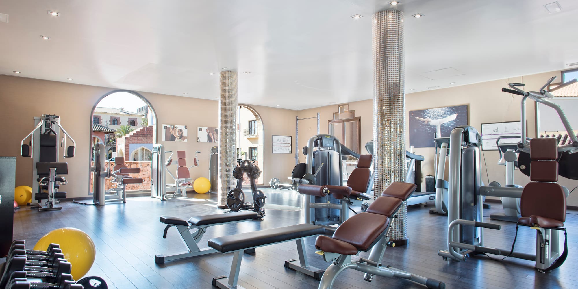 a large gym with exercise equipment